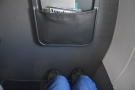 Behiold my legroom! Not quite enough to stretch out, but ample for an hour or two.