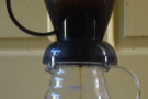 ... on the mug/carafe opens the valve at the bottom and the coffee filters through.