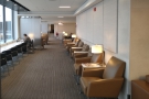A view along the front of the lounge, where the windows overlook the planes.