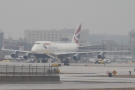 There's a British Airways Boeing 747 parked out on the tarmac.