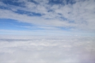 We broke through the top of the clouds five minutes after take-off.