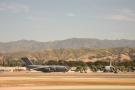 There are also some of these military cargo planes on the tarmac, although it's not...
