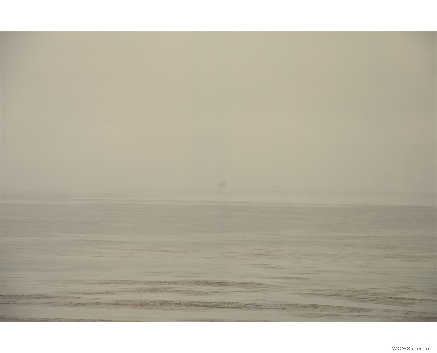 ... although looking out to sea, I can just make out shapes through the coastal mist.
