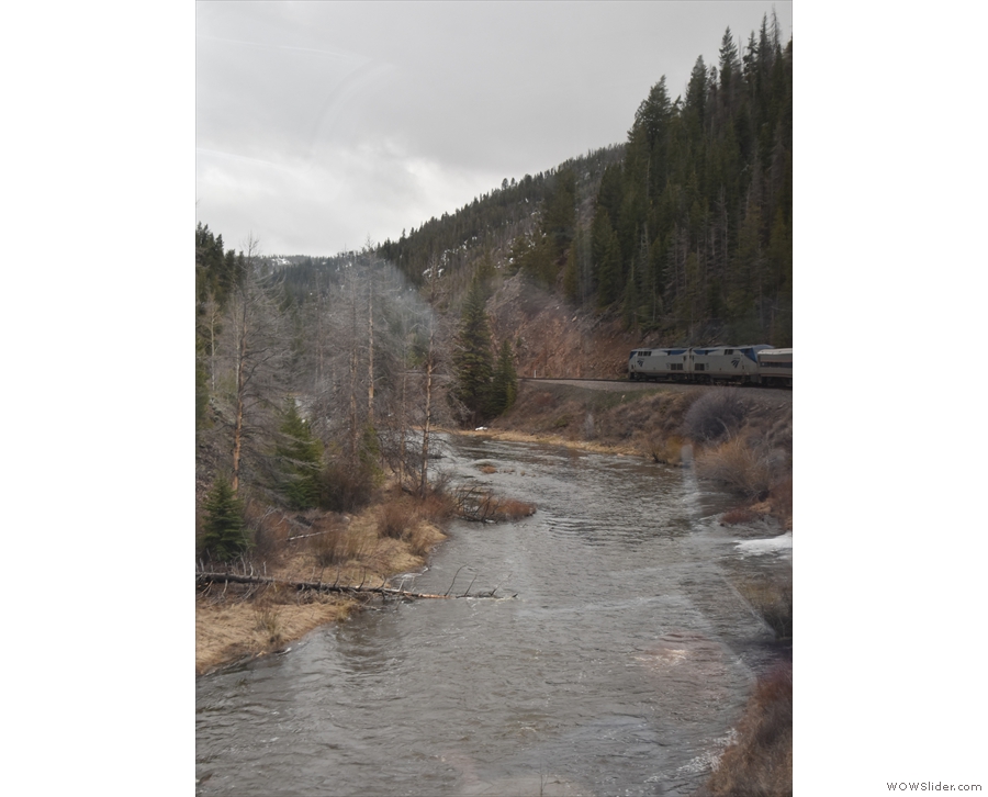 The river and train tracks wind along the valley bottom, giving amply views of the...