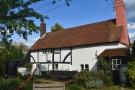 A National Trust cottage in the heart of the Surrey Hills seems an unlikely place for a...