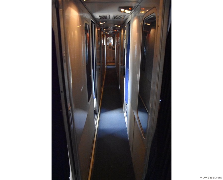 To get to the rest of the train, we had to walk down the narrow corridor to the door...