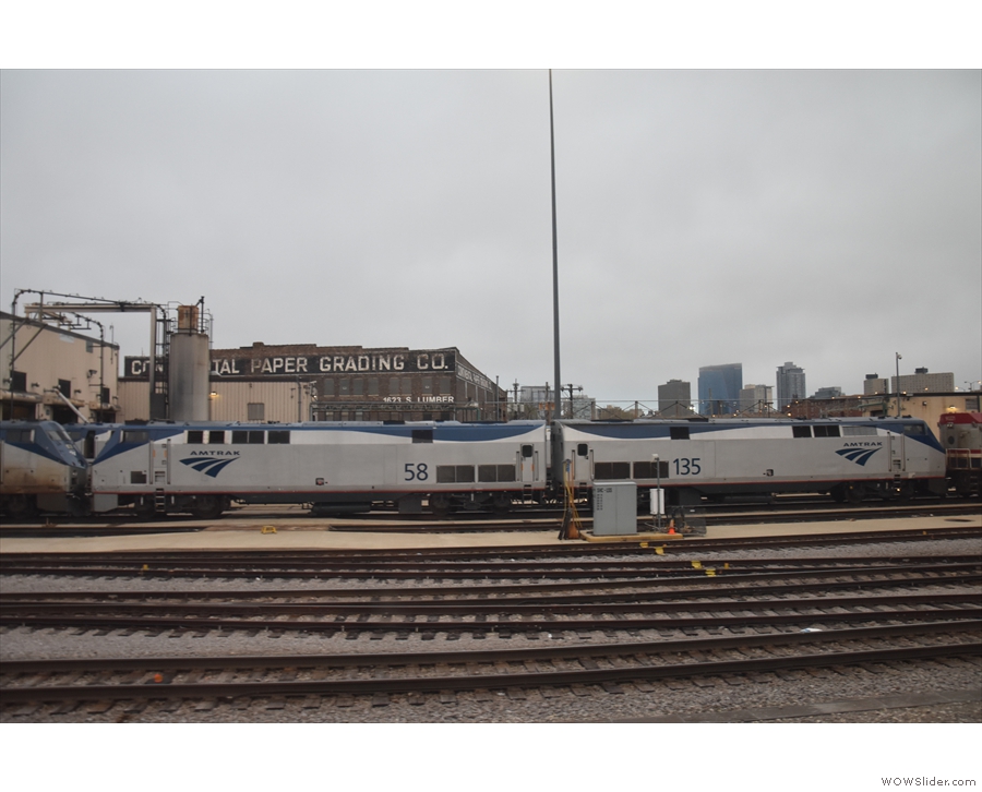 Instead we go past the end of the Amtrak yards and the Continental Paper Grading Co...