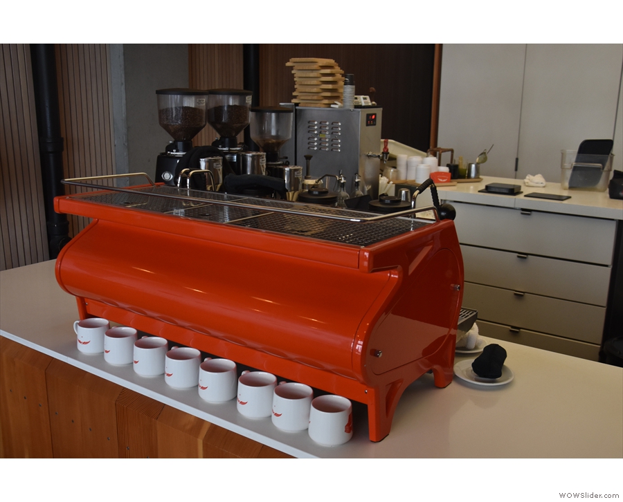 ... before we reach the La Marzocco Strada espresso machine, with its grinders beyond.