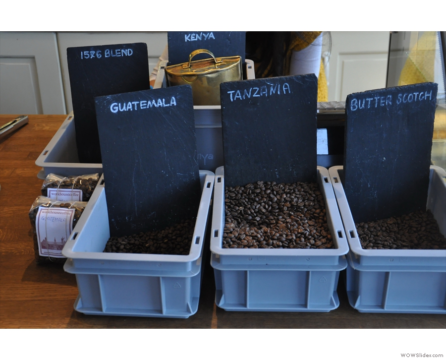 There are coffee beans. For all I've been told about about needing to keep beans airtight and out of the light, Workhouse is happy to have them in open trays...