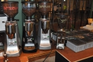 The grinders, between the coffee beans & espresso machines (they were behind the counter).