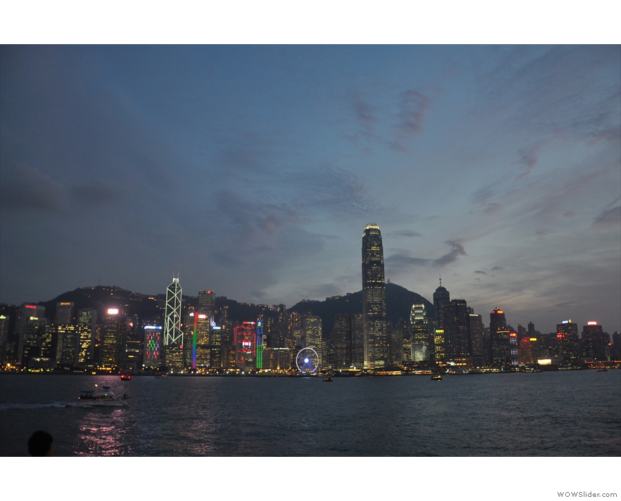 Central at dusk, when things start to light up, with the Peak behind, as seen from Kowloon.