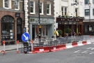 The barriers, by the way, close off the left-hand lane of the street to create an outdoor...