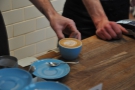 It was busy while I was there. Here a flat white is presented to its saucer.