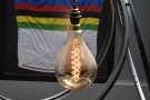 This single, bare bulb hangs below the skylight...