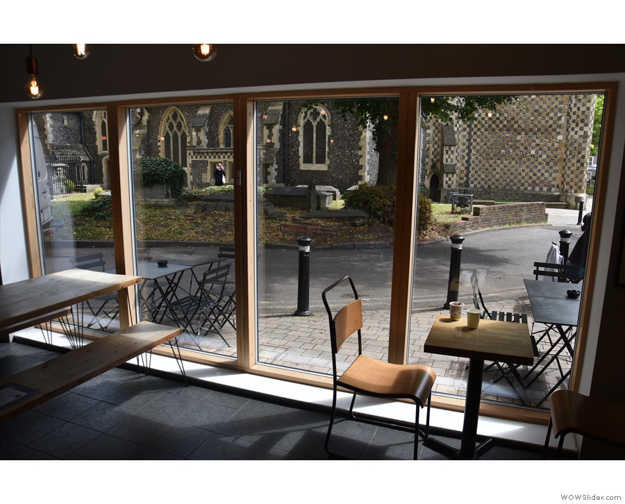 On one side of the windows is a solitary two-person table with good views of the Minster...