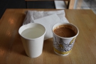 I tried the Greek coffee, served in a takeaway cup, which came with a cup of water.
