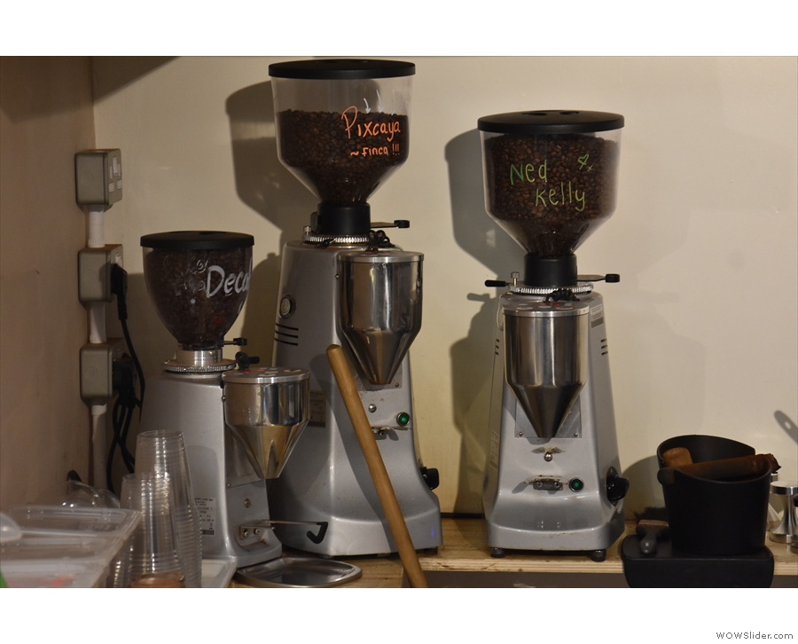 ... while behind them, against the wall, are three grinders with the other espresso options.