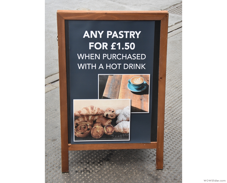 The A-board is promoting the various offers: pastry, anyone?