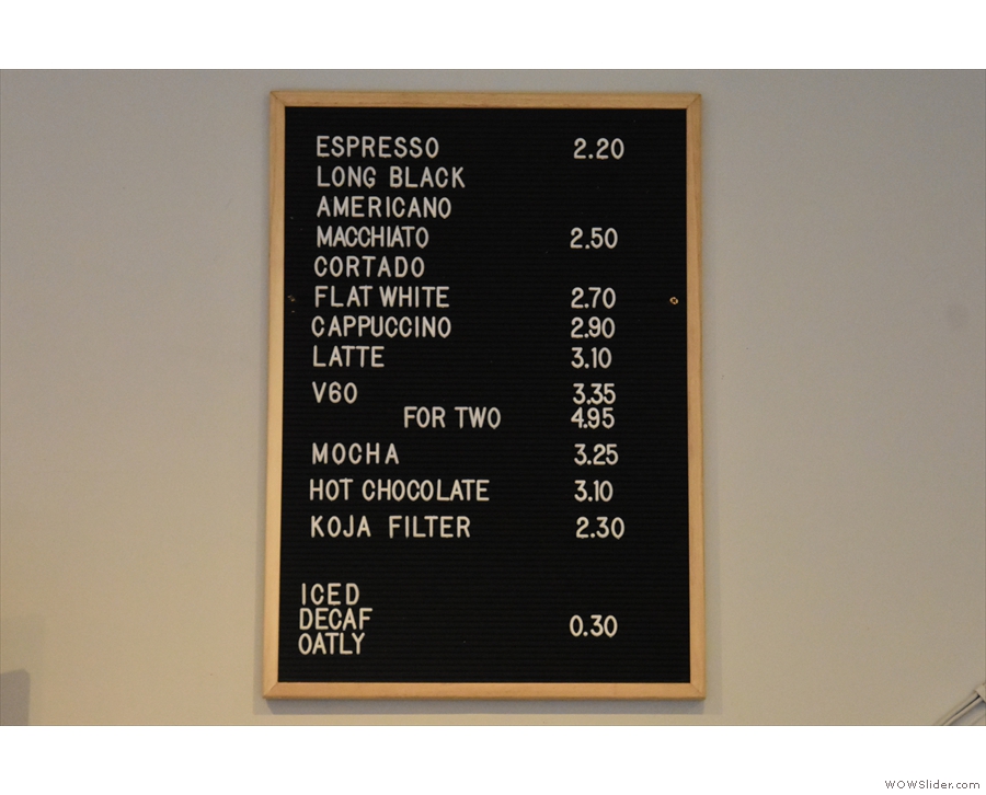 ... and the drinks menu on the wall behind the espresso machine...