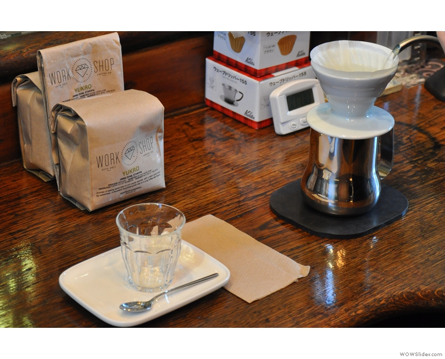 Making a V60: everything is set out ready. First, the filter paper is rinsed.