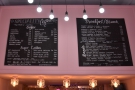 The menus remain on the wall above the counter, although Coffee Addict has expanded...