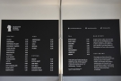 The coffee menu is still in its customary place on the wall to the right of the counter.