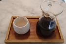 My coffee, served in a carafe, with a handleless cup on the side...