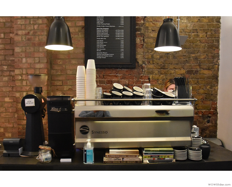 ... while at the far end is the Synesso espresso machine and its grinders.