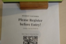 As well as the hand santiser, there's a QR Code to scan, so you can register your details.