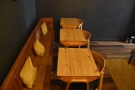 ... a wooden bench against the back wall...