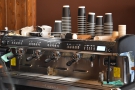 I, of course, came for coffee, made with this four-group espresso machine. For now, it's...