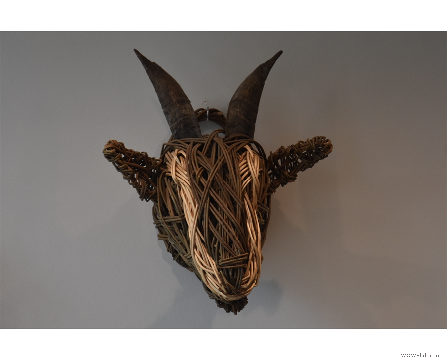 Keeping with the goat theme, this wicker goat's head is one of the original features...