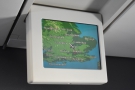 There's a fold-down monitor which shows a map of our route.