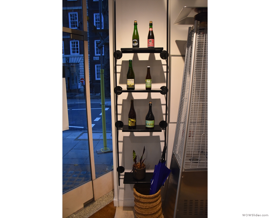 Check out the bottles of wine by the door...