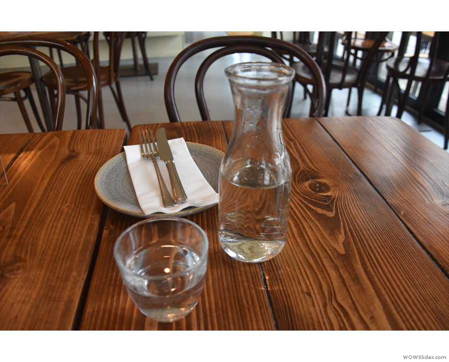 Caravan continues to offer full table service. You get a carafe of water...