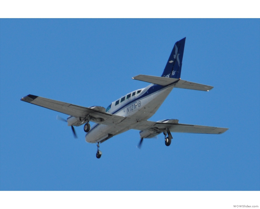 It wasn't all large jets though. This litte Cessna 402 from Cape Air came over...