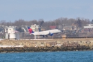 From there I could see the airport and caught this little commuter jet from Delta taking off.