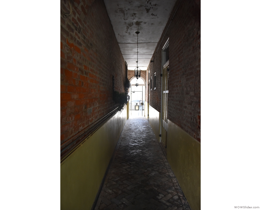 ... led me into a long, narrow passageway (this is the view towards the street).
