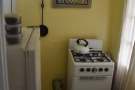 ... and a tiny kitchen with an old gas hob at the front.