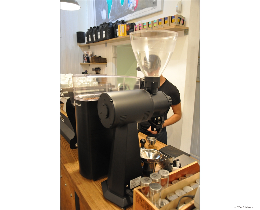 For the grinder-geeks: a Mahlkonig EK43. It grinds the decaf, guest espresso & pour-over.