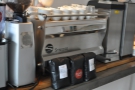 The espresso machine with some Nude Espresso beans for sale