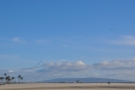 More planes taking off from LAX, with the headland beyond Redondo Beach as a backdrop.