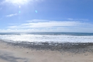 A wide-angle panorama looking out to sea...