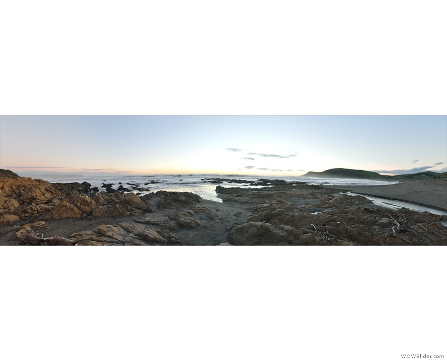A panoramic sweep of the beach, looking out to sea...