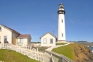 A panorama of the lighthouse and its immediate buildings.