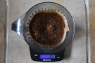 Put the ground coffee in next (in this case, 16.5 grams) and start the timer.