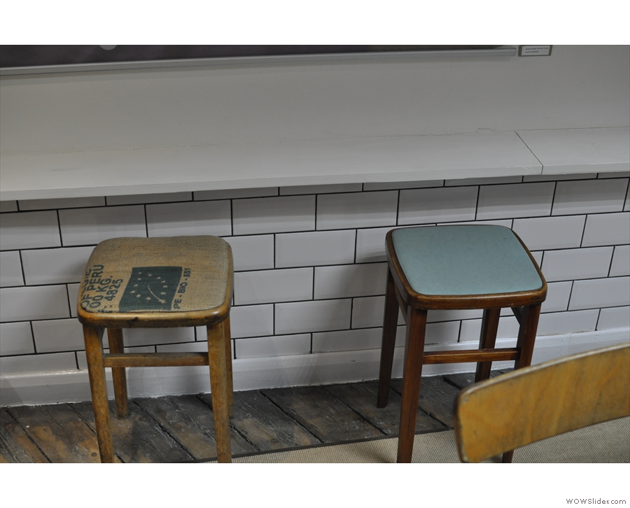 There's also a little bar at the back, to the left of the table, along with with some little stools.