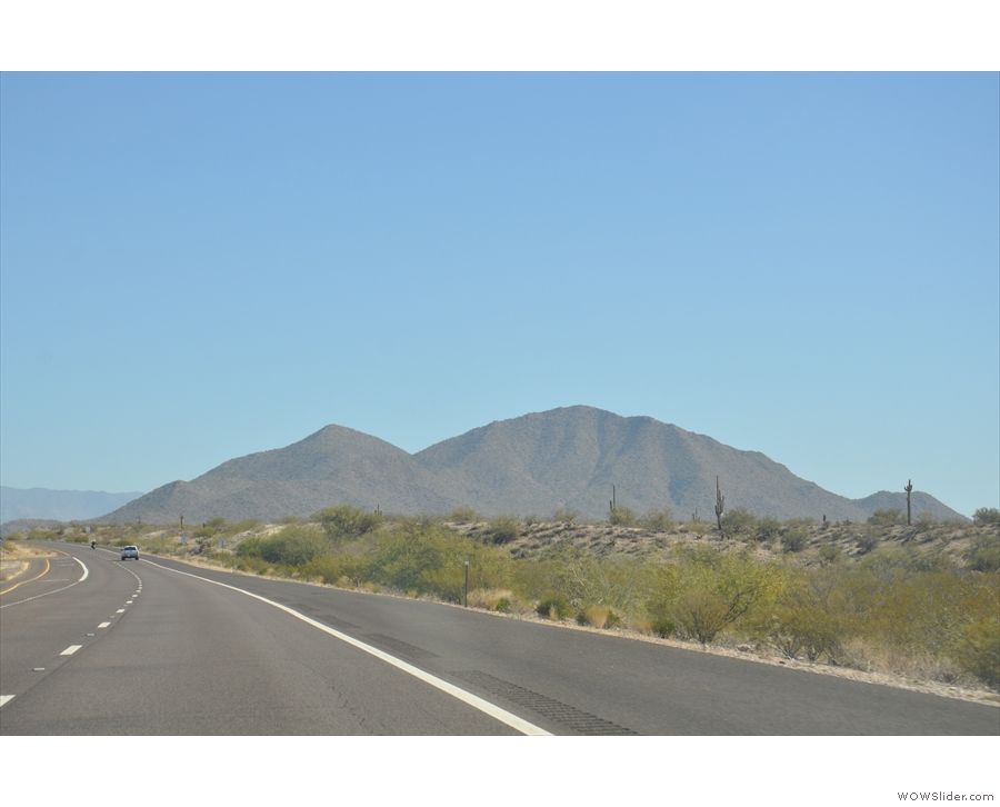 SR 87 goes north through big mountain country. First it skirts the mountains...