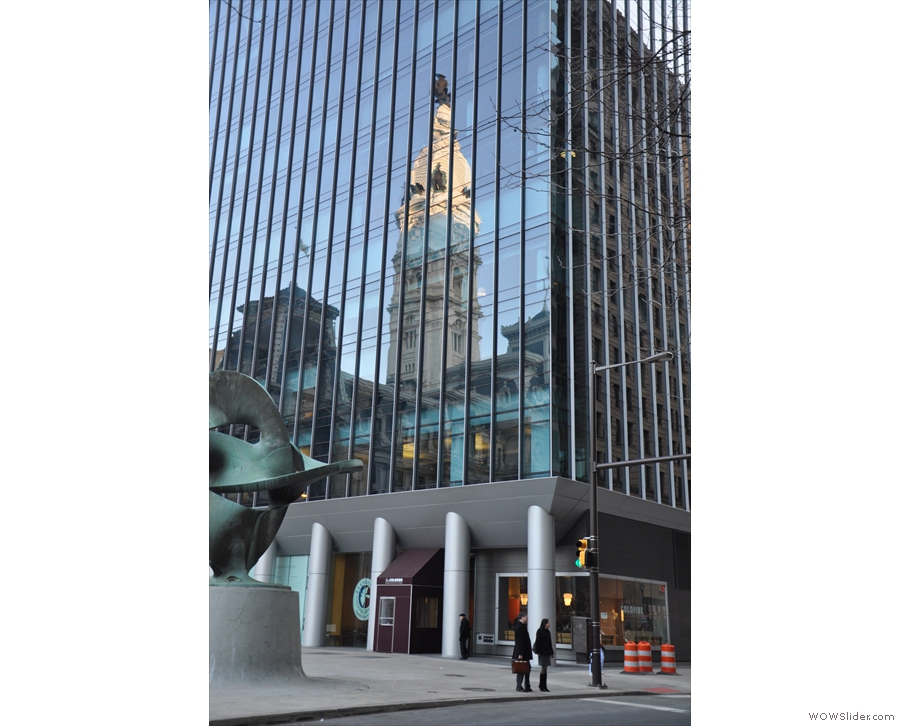 Philadelphia's City Hall, reflected in the glass above La Colombe, Dilworth Plaza.