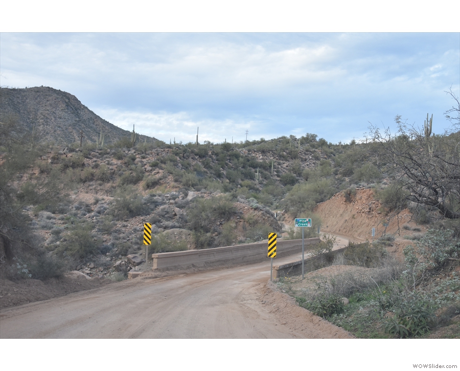 After plenty of twists and turns, the Apache Trail crosses Pine Creek...